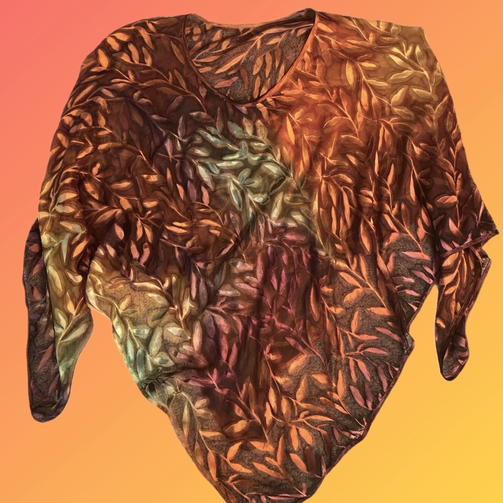 sheer multi colored fall colors; poncho-style pull over.  Worn over tank/sweater